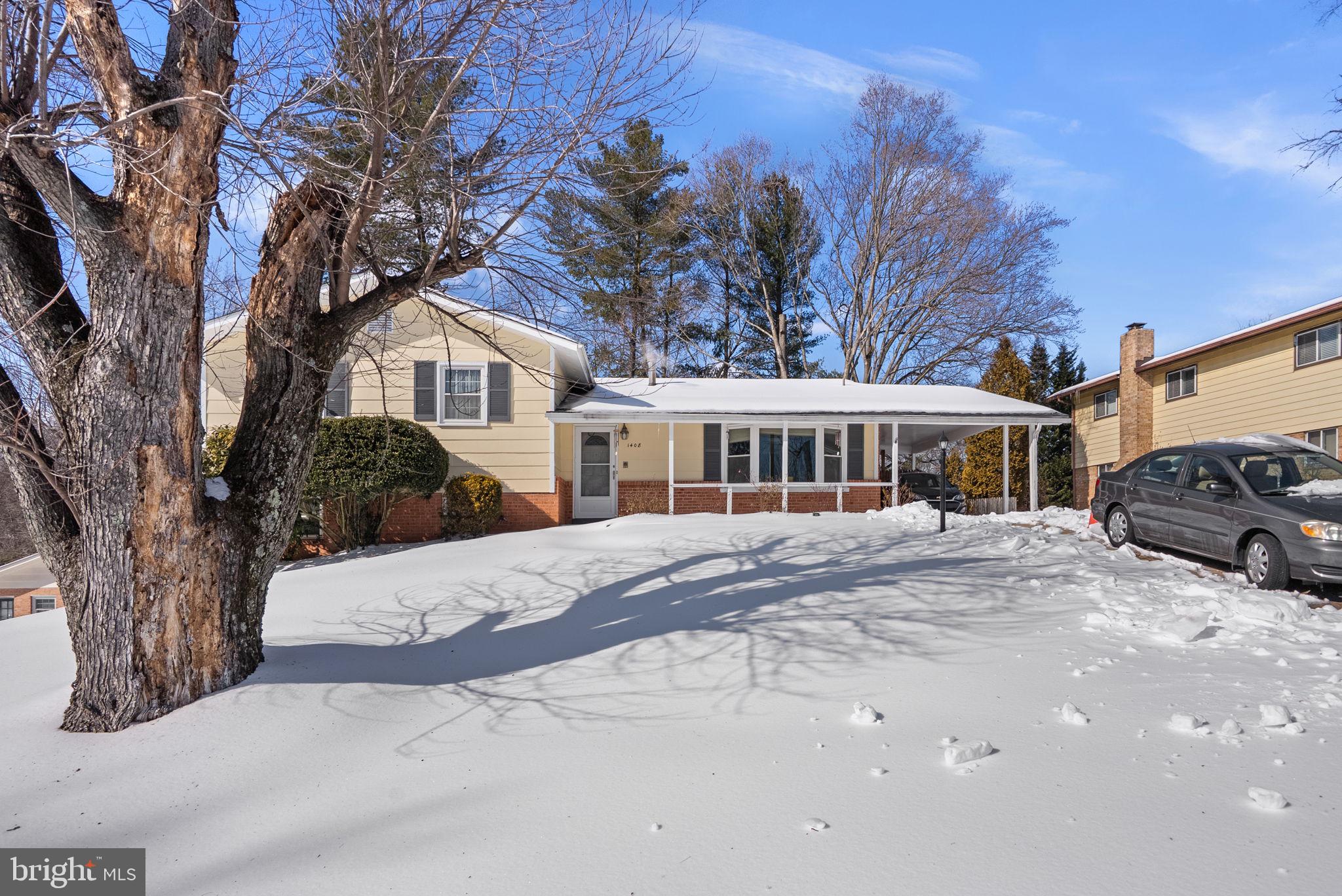 1408 Chilton Drive Silver Spring, MD 20904 - Photo 2 of 29 a front view of a house with a yard