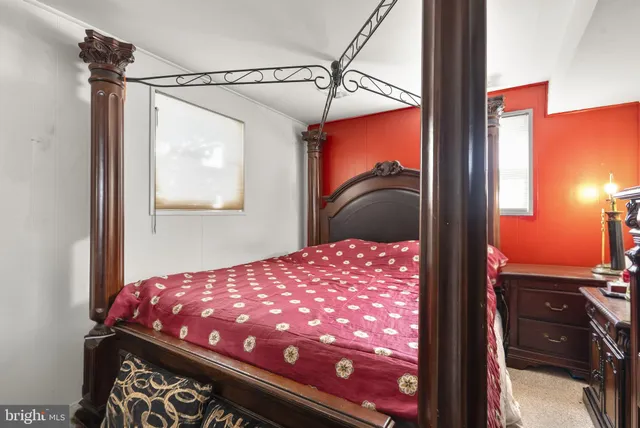 a bedroom with a bed and a closet