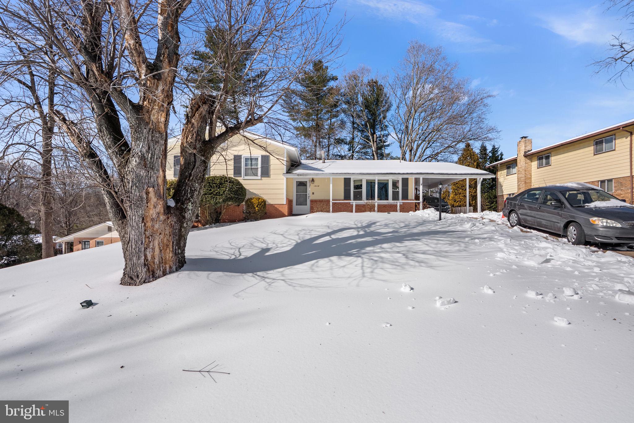 1408 Chilton Drive Silver Spring, MD 20904 - Photo 3 of 29 a front view of a house with a yard