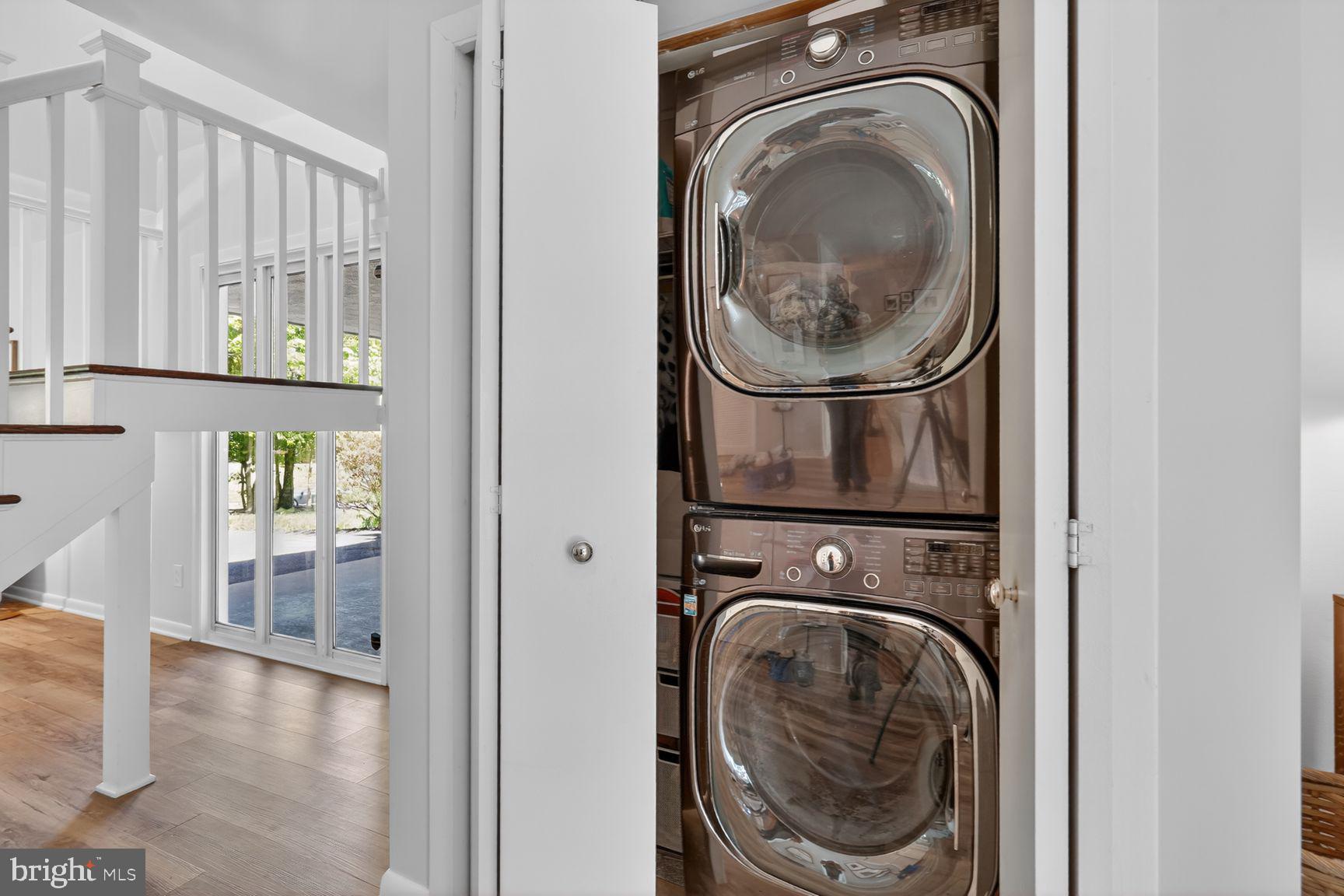 11201 Wedge Drive Reston, VA 20190 - Photo 14 of 31 a utility room with dryer and washer