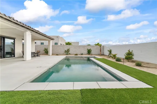 a view of a house with a swimming pool