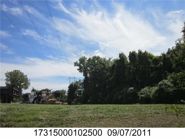 $995,000 | 1409 Northeast Russell Rd., Kansas City, MO 64116
