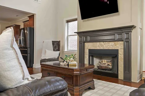 a spacious bathroom with a granite countertop sink and a mirror