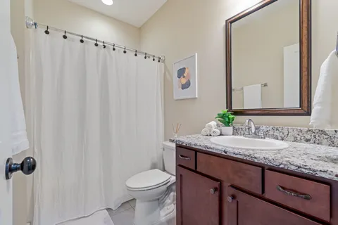a living room with lots of baby furniture and toys