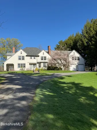 a view of a house with a big yard