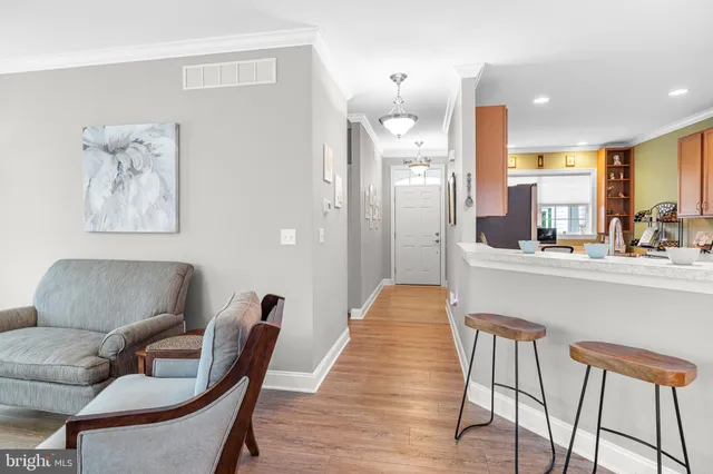 a bathroom with a sink toilet and a mirror