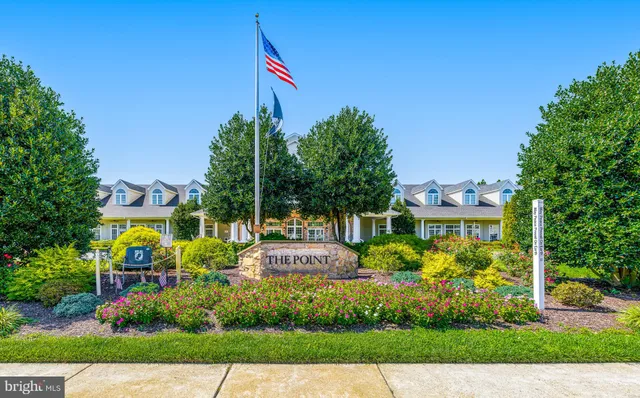 a view of yard with swimming pool and green space