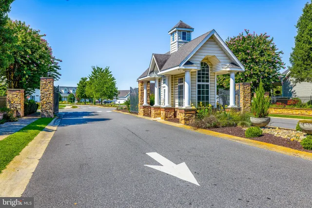 a view of a house with a yard and a swimming pool