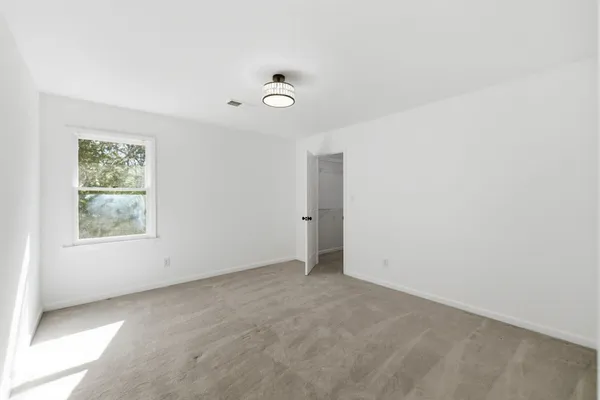 an empty room with windows