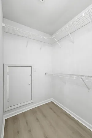 a view of a room with racks on the wall