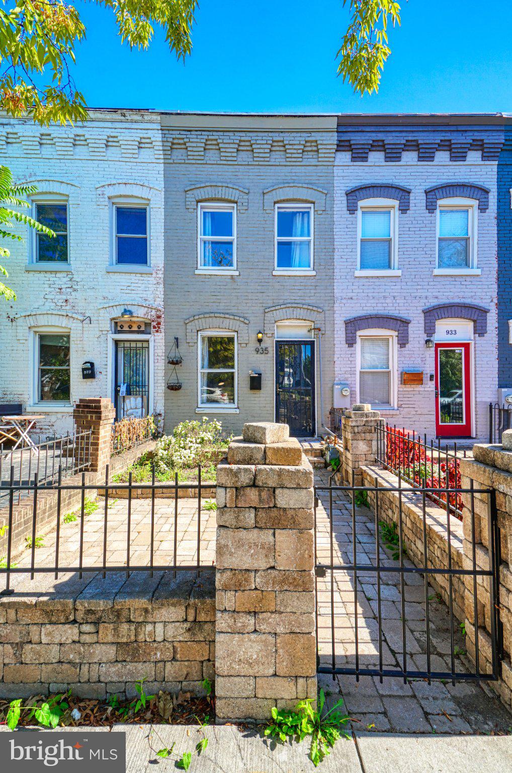 935 8th Street Northeast Washington, DC 20002 - Photo 2 of 19 Charming row homes with vibrant facades.