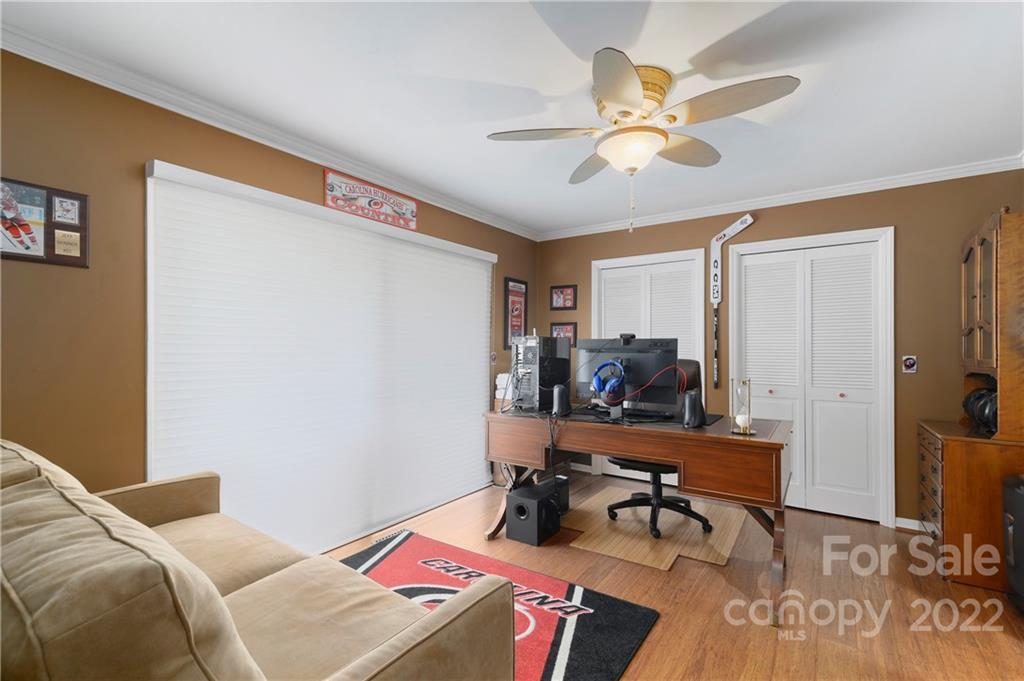 1674 Camp Branch Road Waynesville, NC 28786 - Photo 31 of 48 a living room with furniture and a window