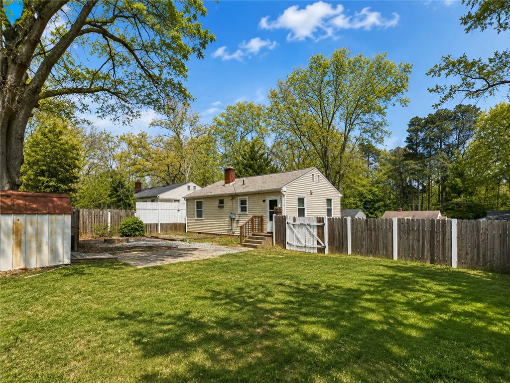 1909 Northview Avenue Anderson, SC 29625 - Photo 19 of 21 This residence offers a spacious private yard with mature trees, perfect for outdoor activities and relaxation.