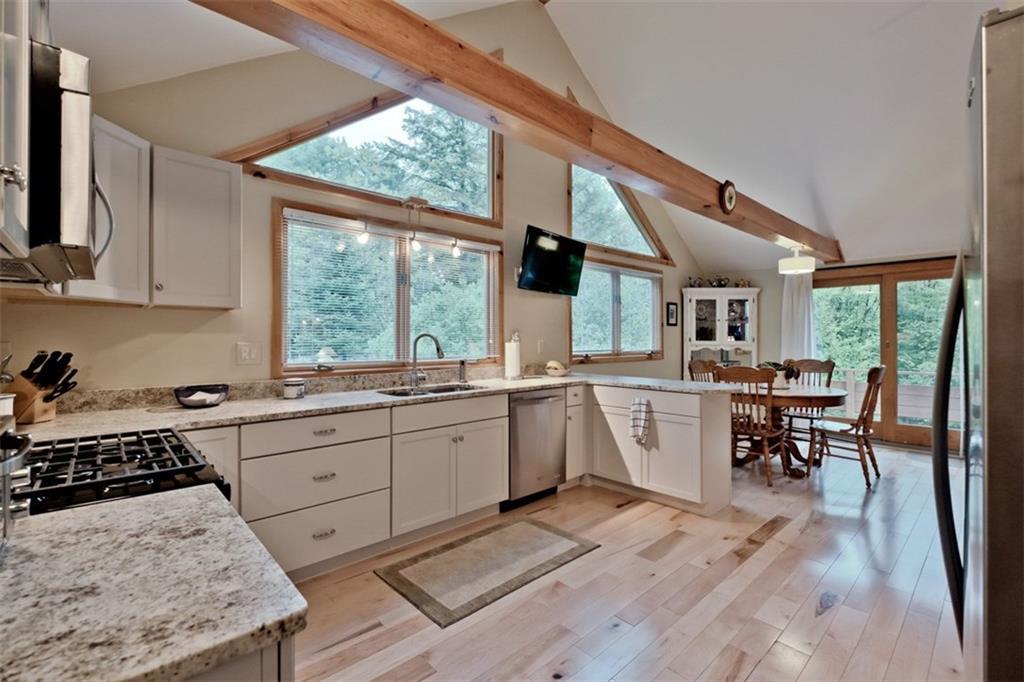 60 Mountain Road Bridgton, ME 04009 - Photo 13 of 35 Gleaming wood floors, cathedral...