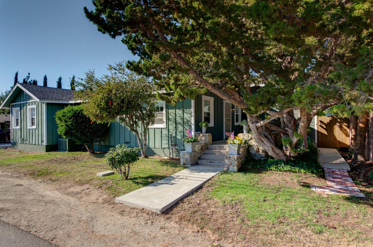 195 Grapevine Road Oak View, CA 93022 - Photo 1 of 41 a view of a house with backyard and a tree