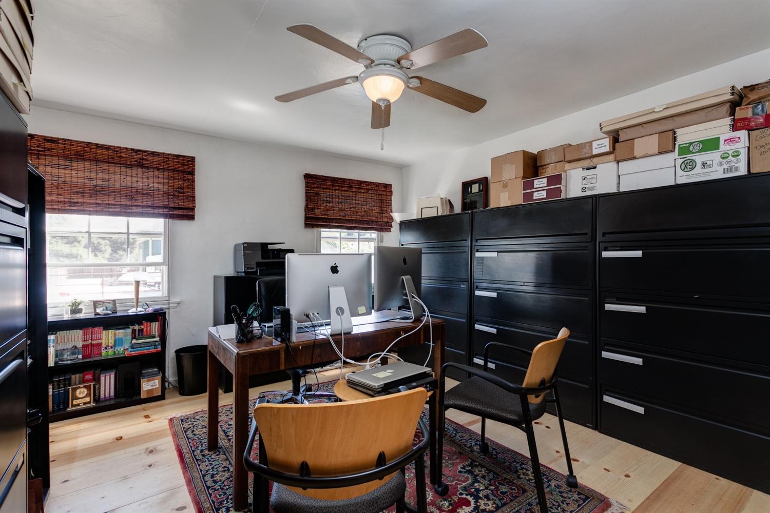 195 Grapevine Road Oak View, CA 93022 - Photo 12 of 41 a work room with furniture a flat screen tv and a window
