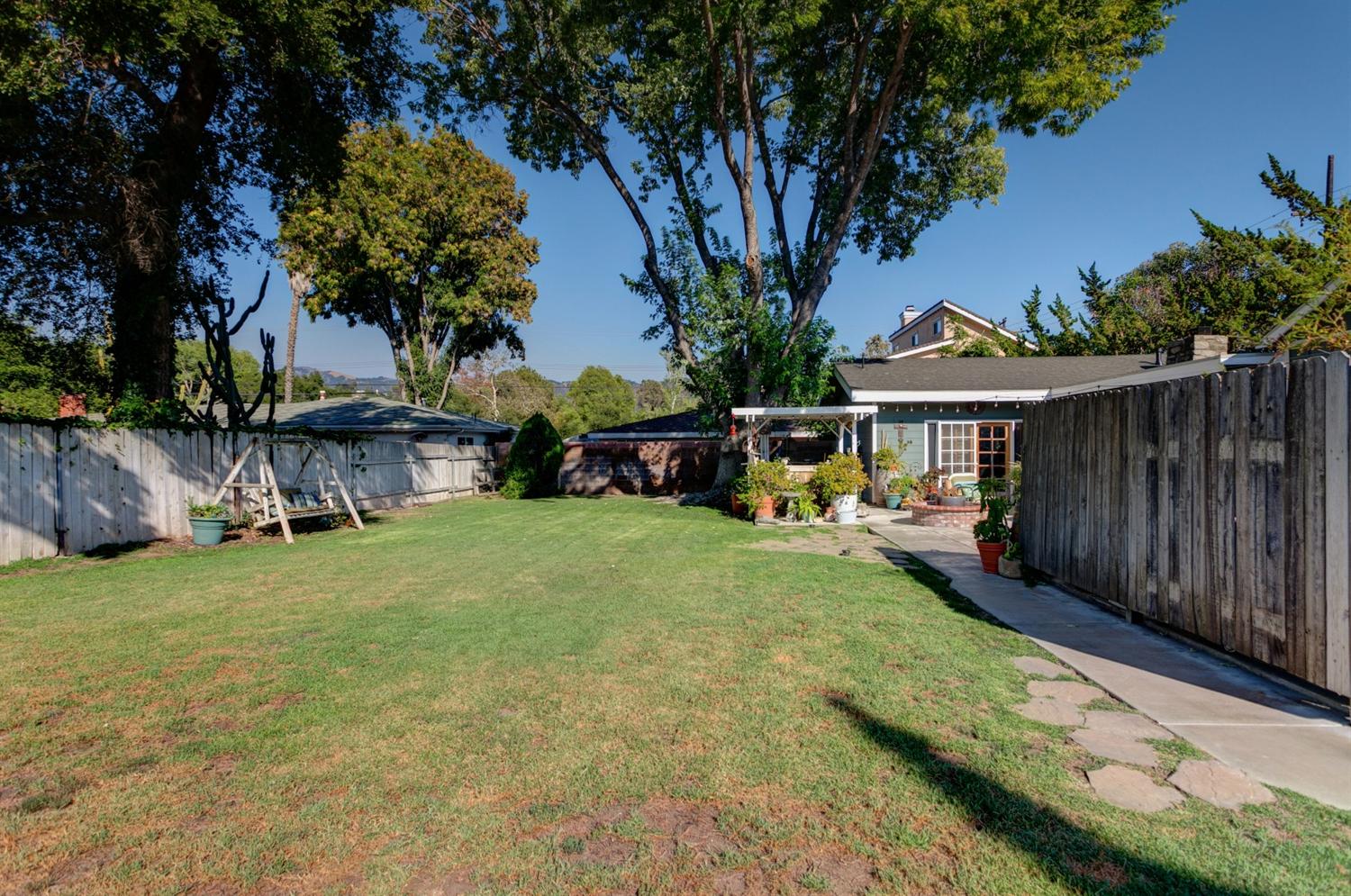 195 Grapevine Road Oak View, CA 93022 - Photo 36 of 41 a view of a house with backyard and sitting area