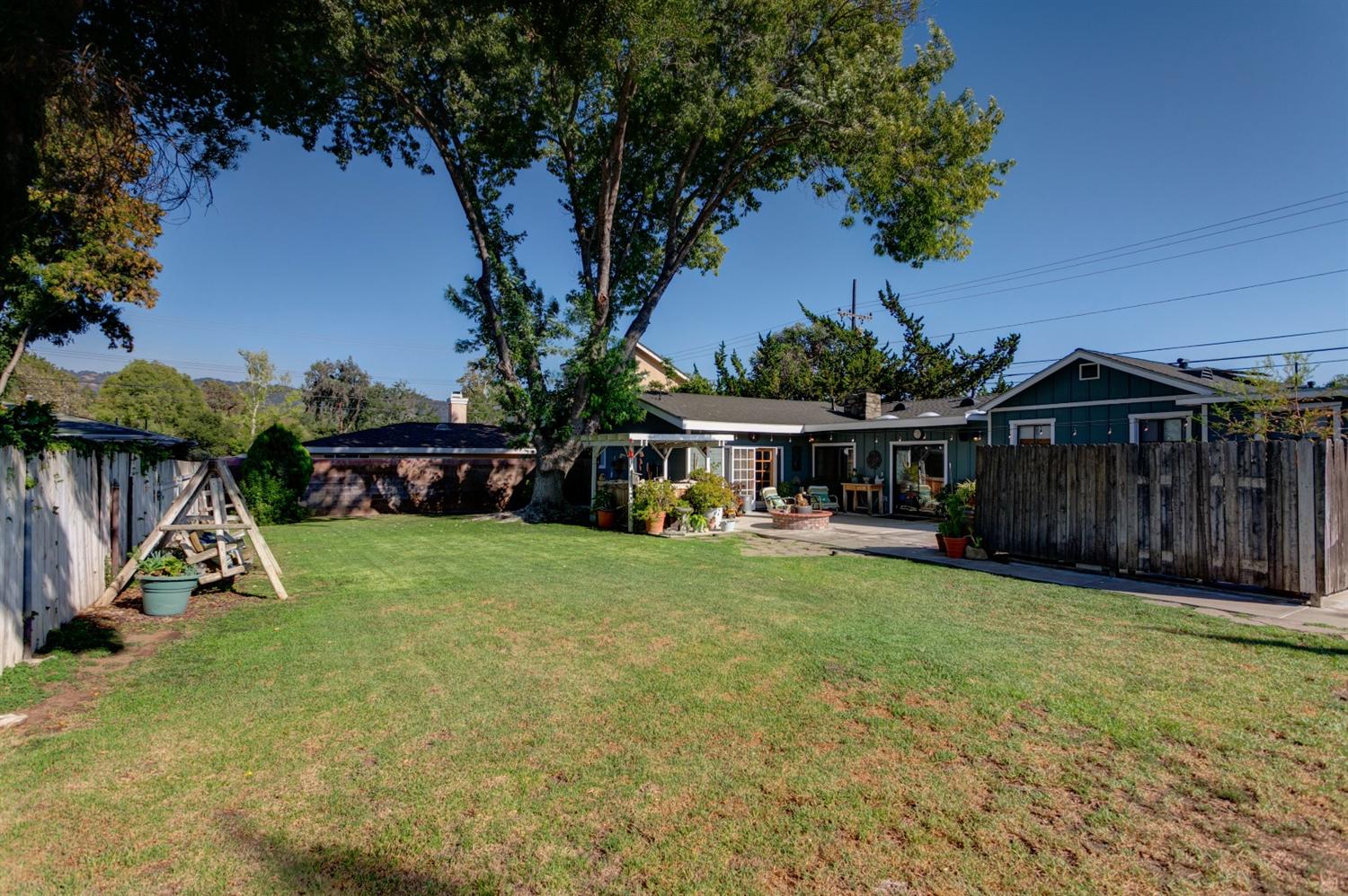 195 Grapevine Road Oak View, CA 93022 - Photo 37 of 41 a view of a house with garden and a tree