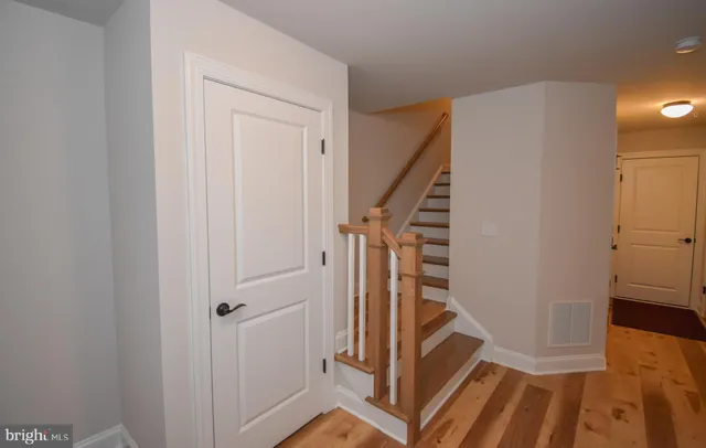 a view of a hallway with staircase