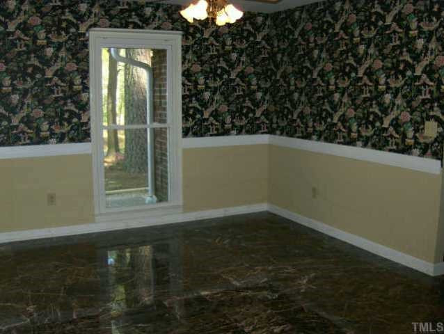 120 Singleton Street Raleigh, NC 27606 - Photo 5 of 12 Formal Dining Room with Marble Tile Floors Other