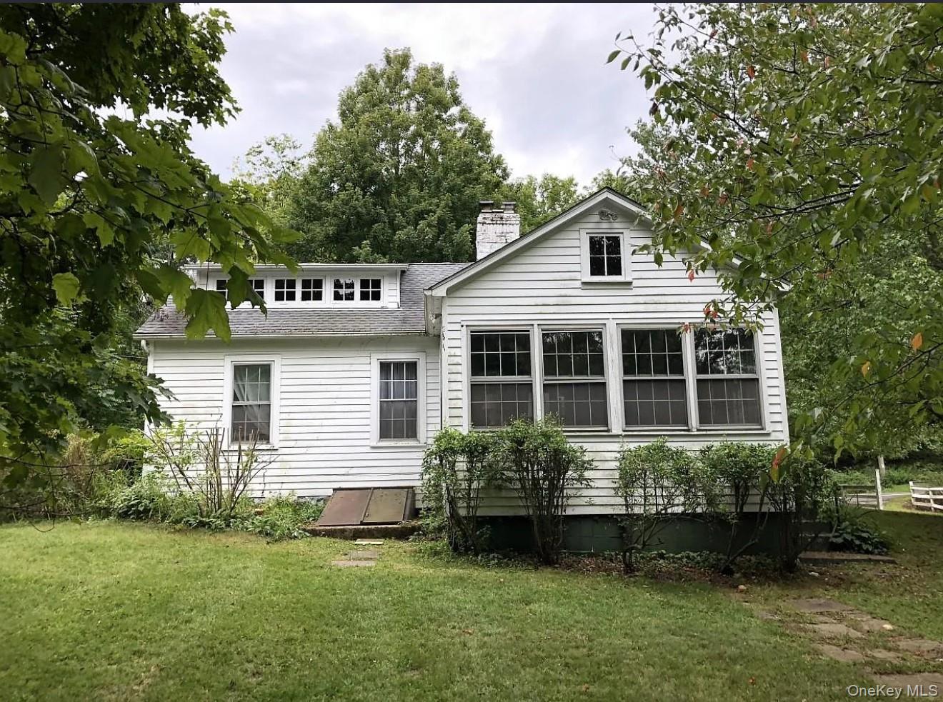 717 Spring Lake Road Red Hook, NY 12571 - Photo 1 of 19 a house view with a garden space