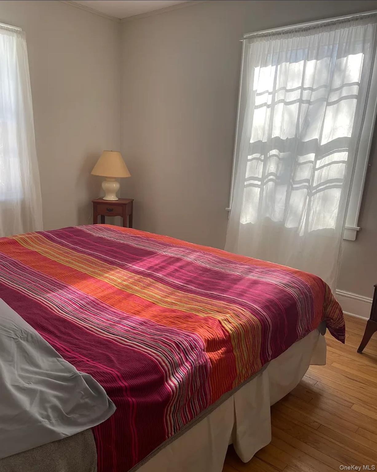 717 Spring Lake Road Red Hook, NY 12571 - Photo 17 of 19 a bedroom with a bed and window