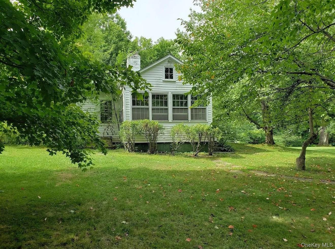 717 Spring Lake Road Red Hook, NY 12571 - Photo 3 of 19 a view of a house with a backyard
