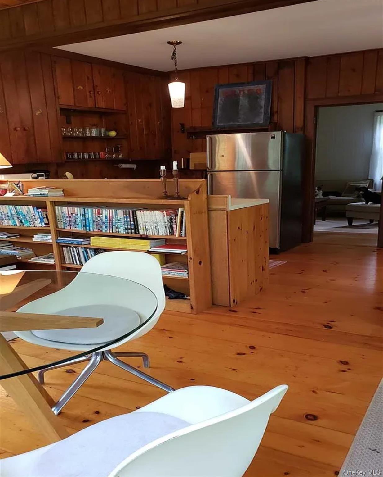 717 Spring Lake Road Red Hook, NY 12571 - Photo 8 of 19 a kitchen with stainless steel appliances kitchen island granite countertop a refrigerator a stove and a sink with wooden cabinets