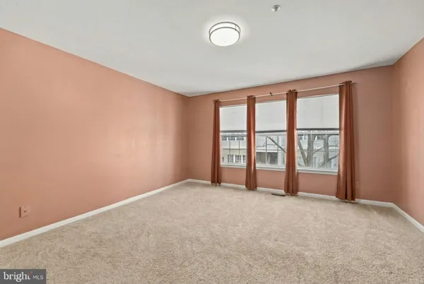 a bathroom with a sink mirror bathtub and toilet