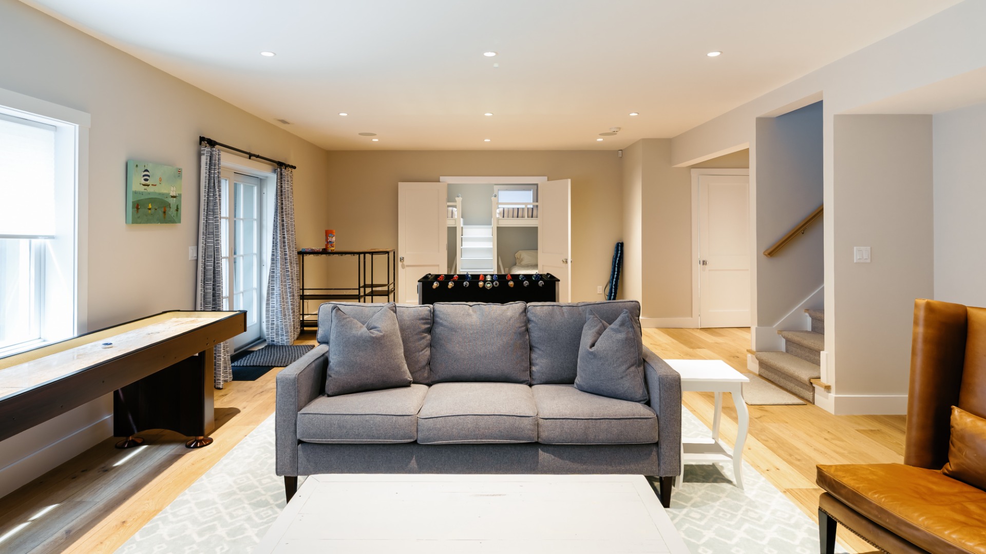 86 Cliff Road Nantucket, MA 02554 - Photo 20 of 29 a living room with furniture and a flat screen tv