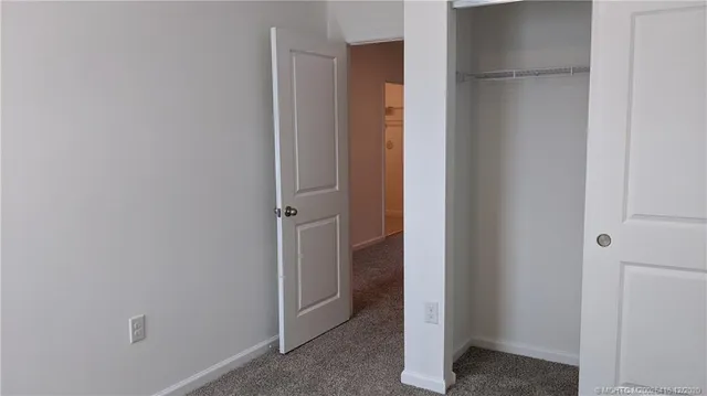 a view of a park with sitting area