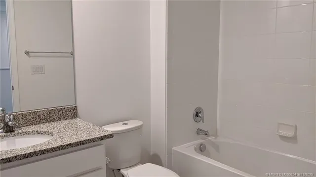 a view of a lake with a city