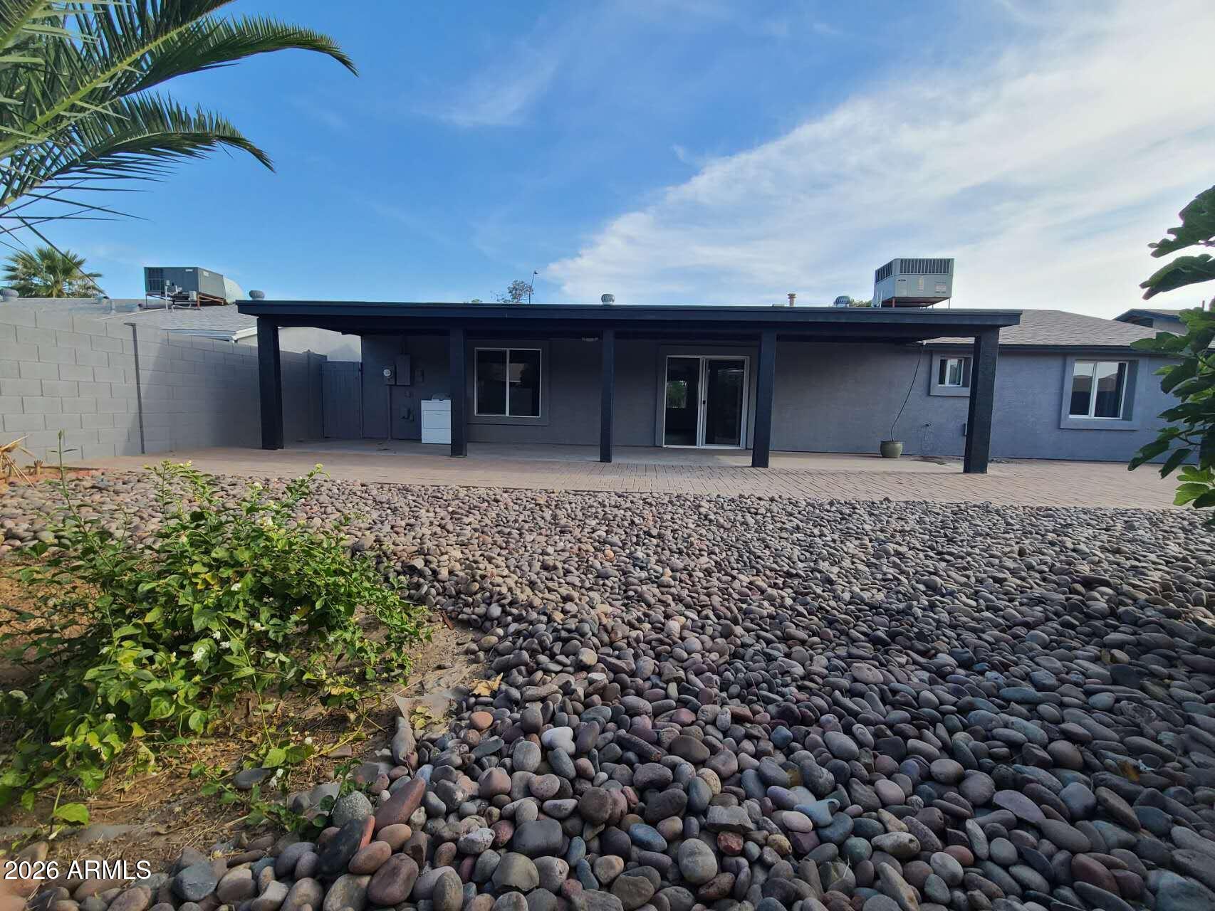 3702 East Thunderbird Road Phoenix, AZ 85032 - Photo 23 of 23 a front view of a house with a yard