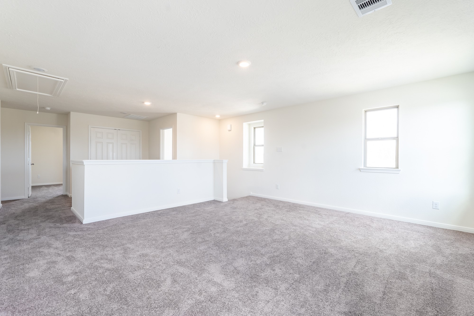 6120 Whitewing Road Rosenberg, TX 77469 - Photo 25 of 35 an empty room with windows
