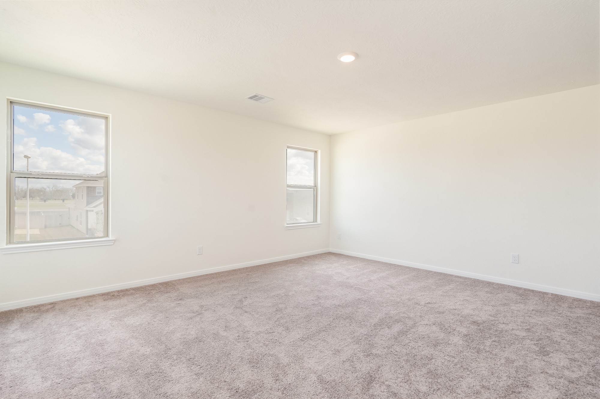 6120 Whitewing Road Rosenberg, TX 77469 - Photo 27 of 35 an empty room with windows