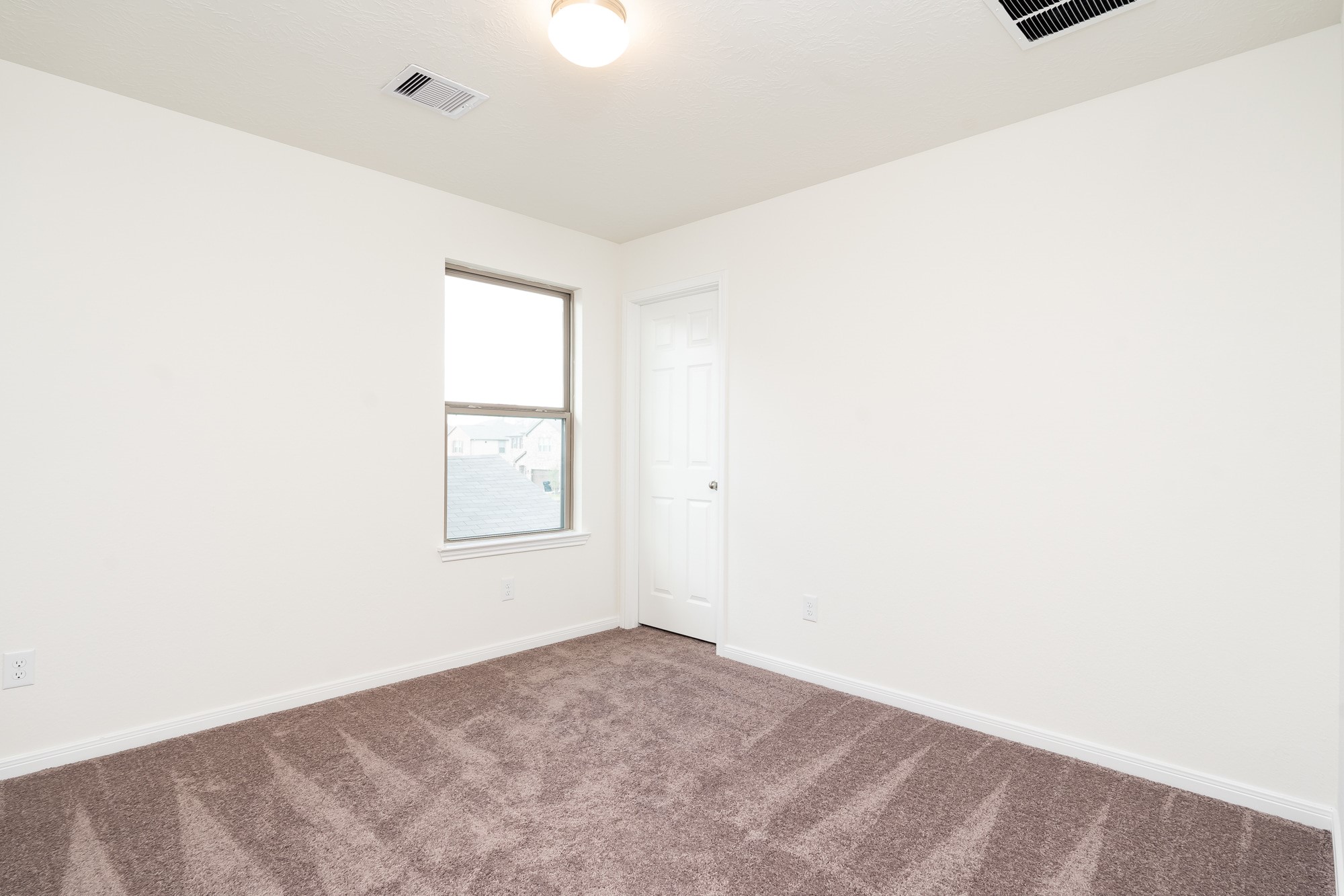 6120 Whitewing Road Rosenberg, TX 77469 - Photo 30 of 35 a view of an empty room with a window
