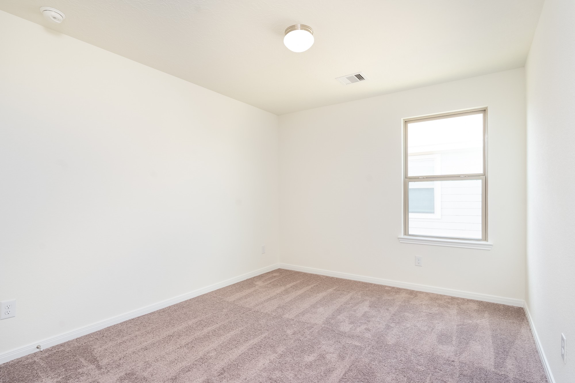 6120 Whitewing Road Rosenberg, TX 77469 - Photo 32 of 35 an empty room with a window