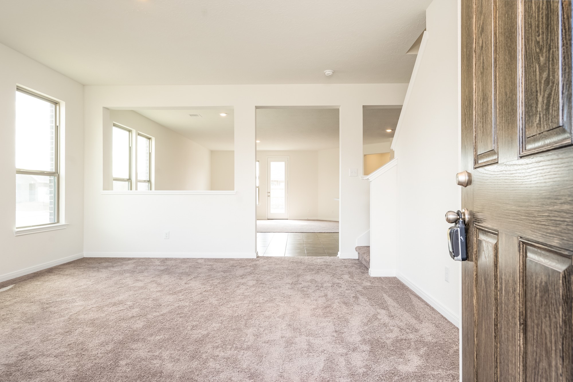 6120 Whitewing Road Rosenberg, TX 77469 - Photo 4 of 35 an empty room with windows