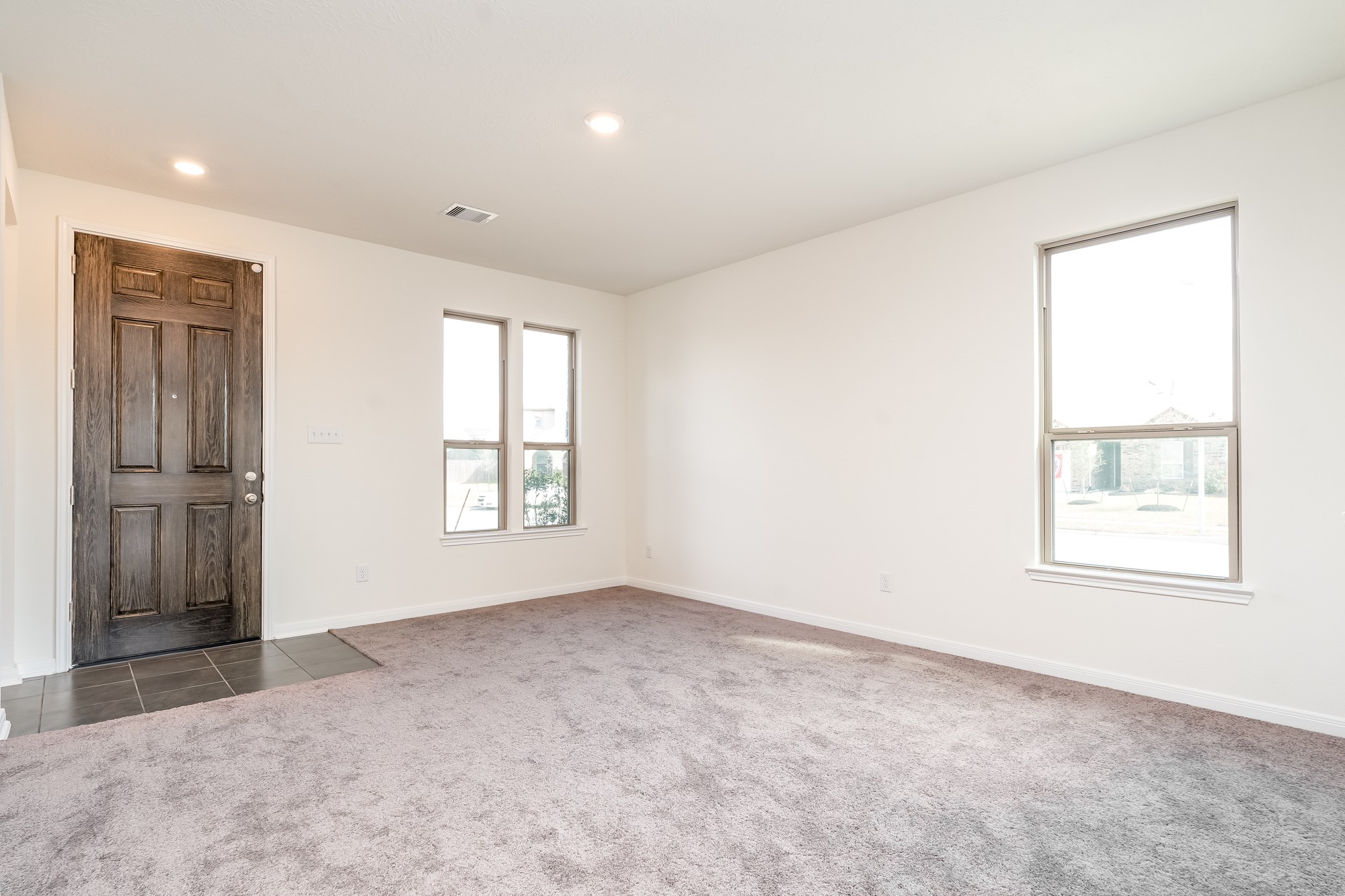 6120 Whitewing Road Rosenberg, TX 77469 - Photo 6 of 35 an empty room with windows