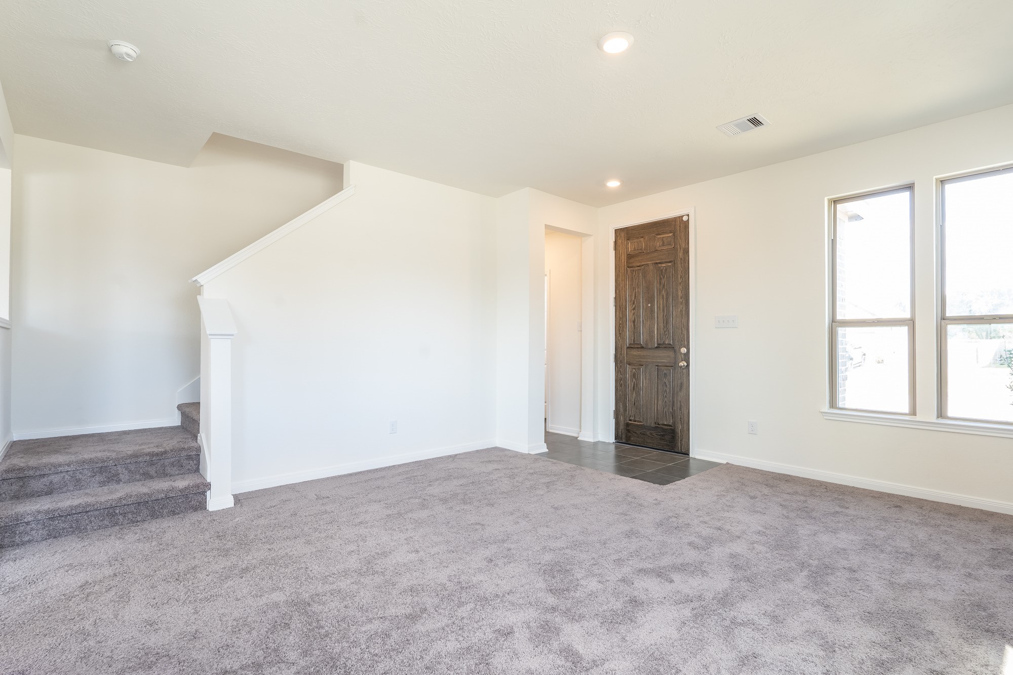 6120 Whitewing Road Rosenberg, TX 77469 - Photo 7 of 35 an empty room with windows and closet