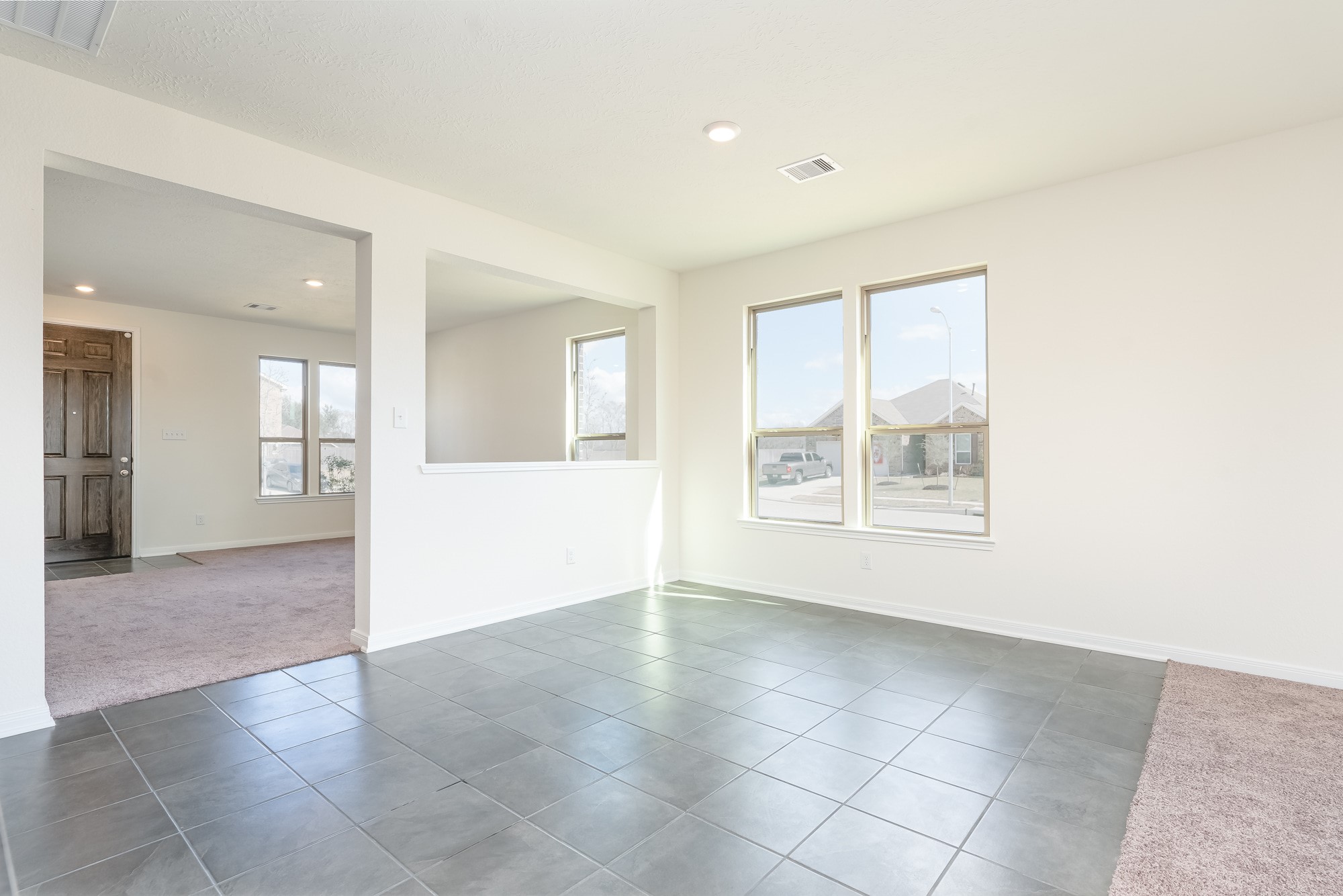 6120 Whitewing Road Rosenberg, TX 77469 - Photo 9 of 35 a view of an empty room with a window