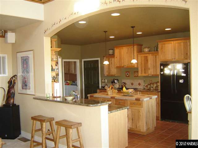 100 Antelope Valley Road Reno, NV 89506 - Photo 4 of 9 a kitchen with sink and refrigerator