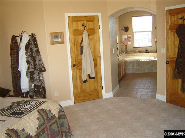 100 Antelope Valley Road Reno, NV 89506 - Photo 9 of 9 a bedroom with a bed and a view of bathroom