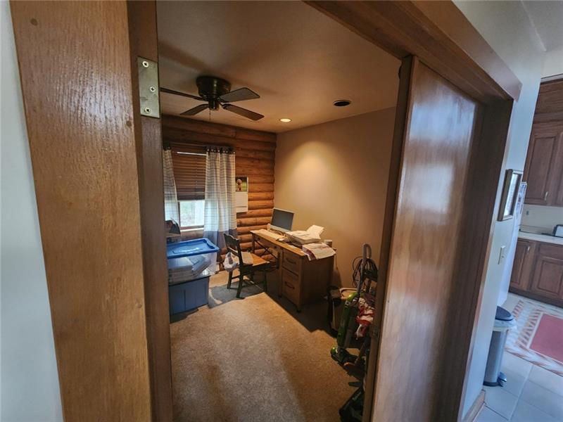 222 Camelot Road Portersville, PA 16051 - Photo 16 of 16 a view of a livingroom with storage space