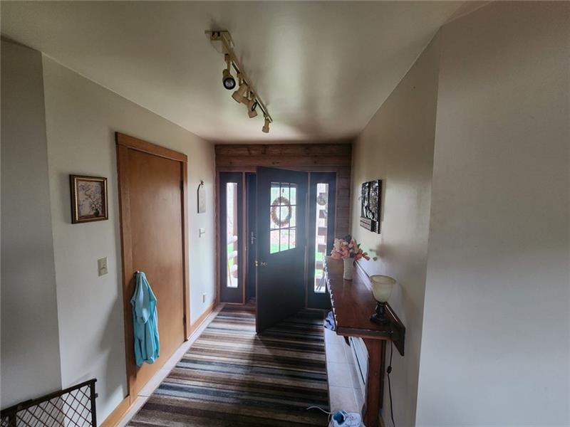222 Camelot Road Portersville, PA 16051 - Photo 4 of 16 a view of a hallway view with staircase