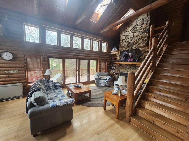 222 Camelot Road Portersville, PA 16051 - Photo 9 of 16 a living room with furniture and a large window