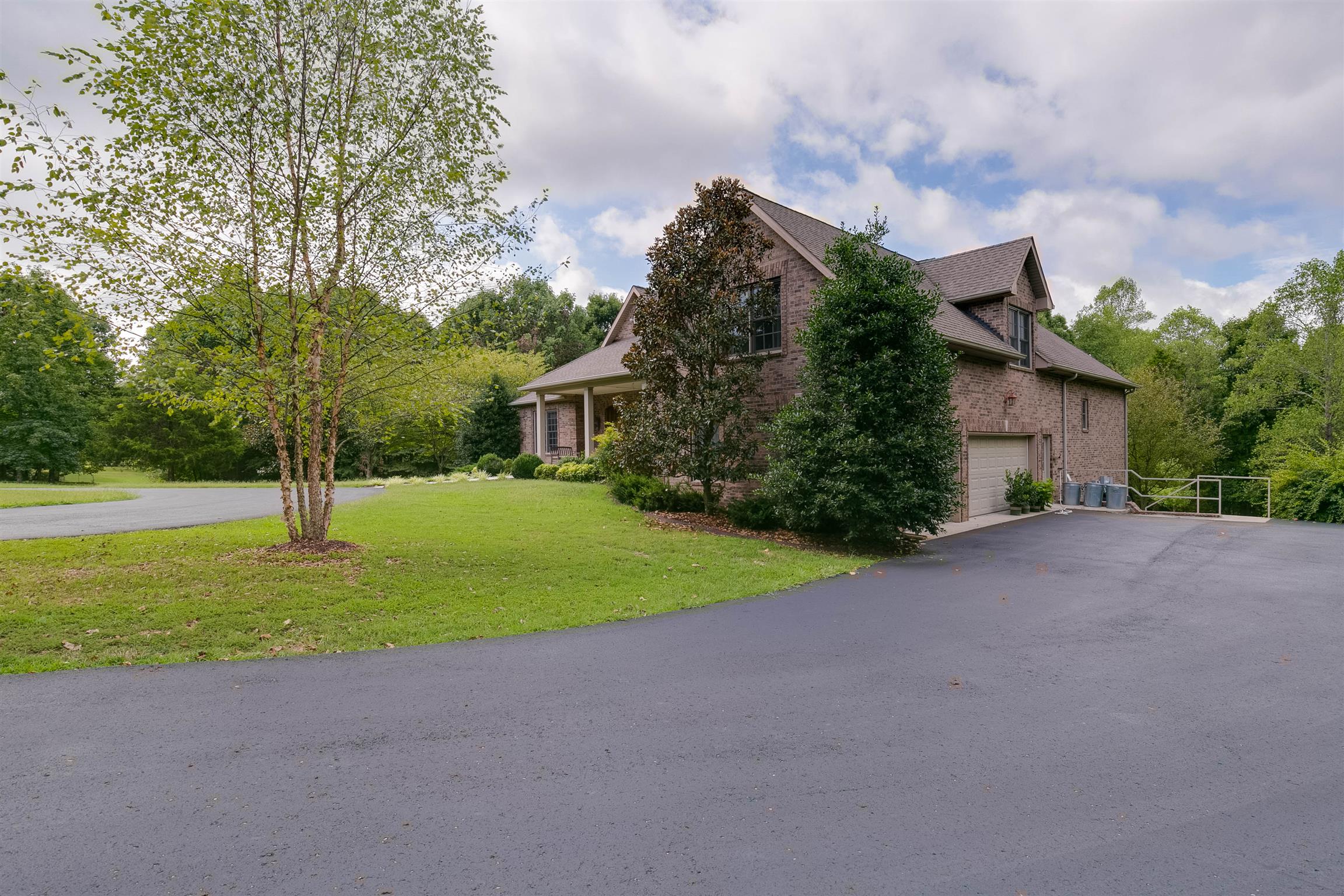 3637 Forte Road Joelton, TN 37080 - Photo 2 of 30 Side view showing the Upper Garages....3 Car