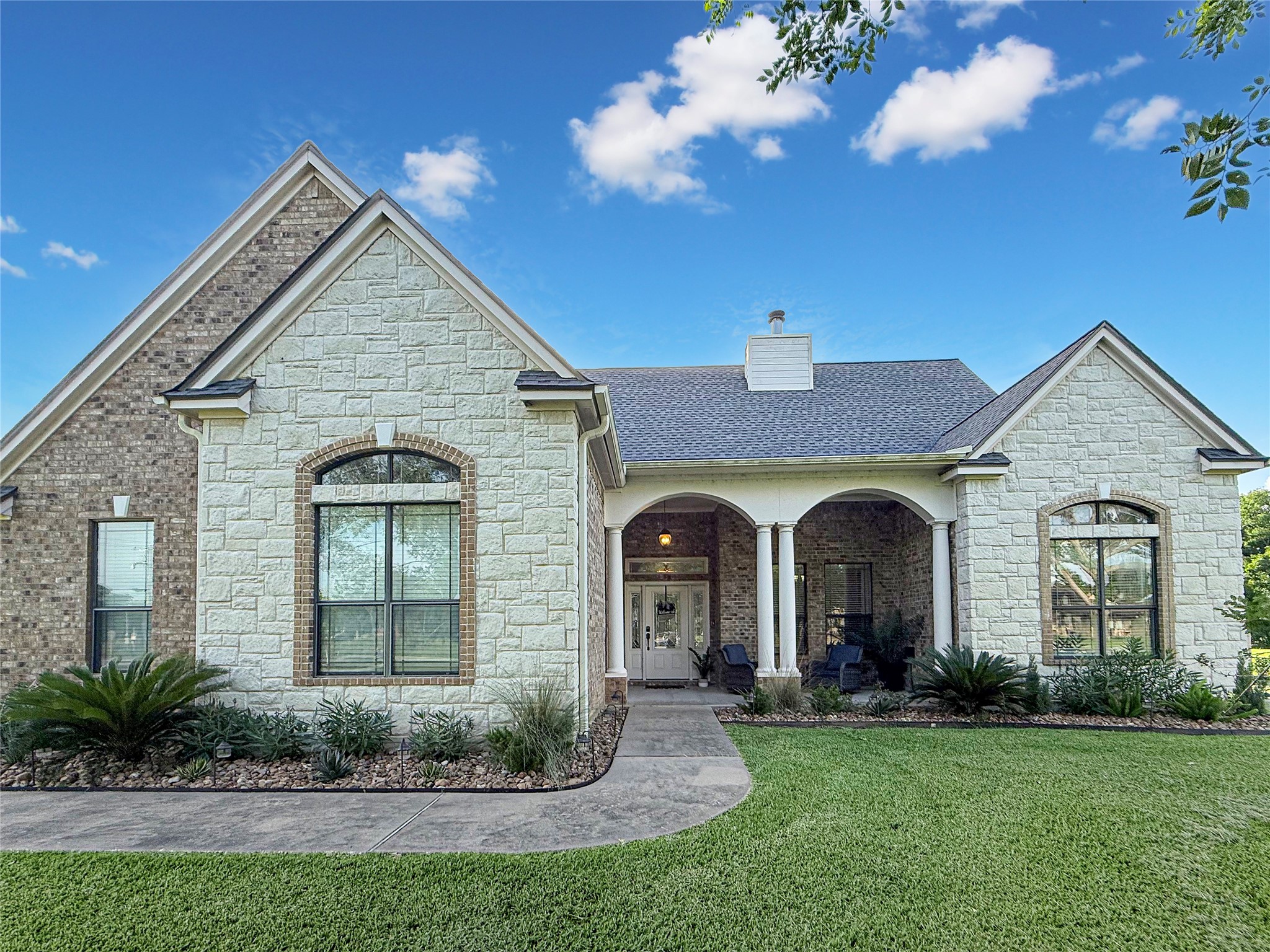 807 Mill Road Angleton, TX 77515 - Photo 1 of 46 Charming covered front porch with welcoming curb appeal.
