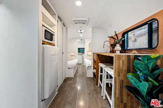 a view of a hallway with workspace