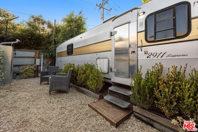 a bench sitting in front of a building